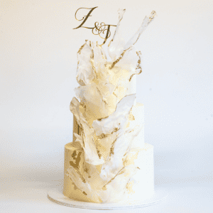 3 tier white and gold wedding cake